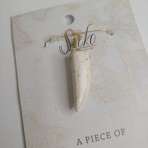 NWT Sseko Strength Charm made in Africa